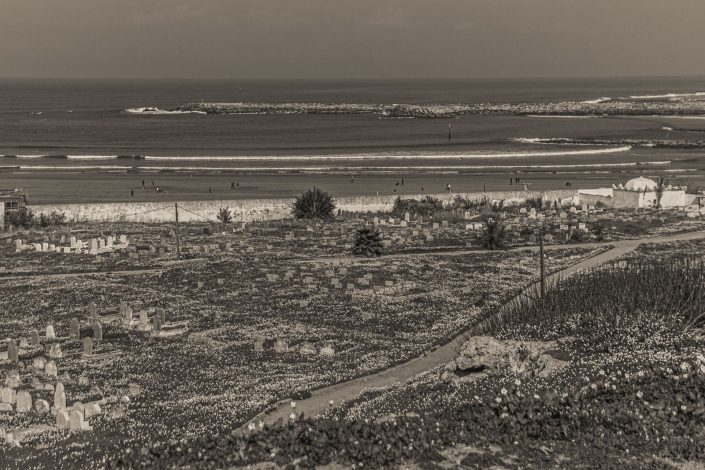 Sea in Rabat with graves on the foreground