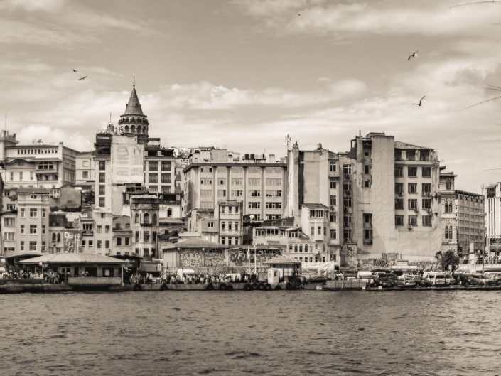 View of Istanbul and the fishing rods at Galata bridge