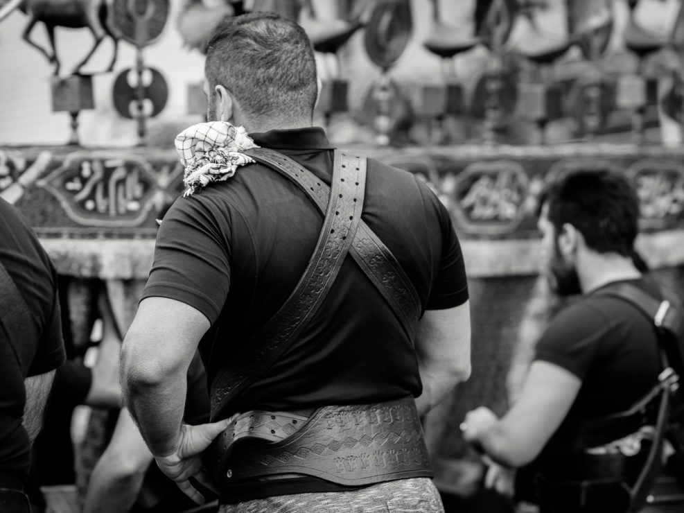 Muscled strong men during Ashura, Iran