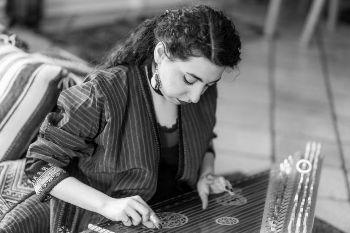Qanun female musician playing