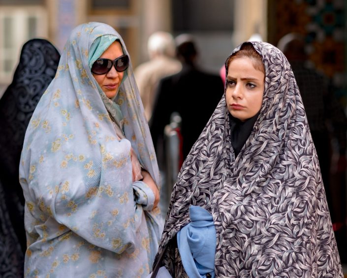 Mother and daughter outside a mosque