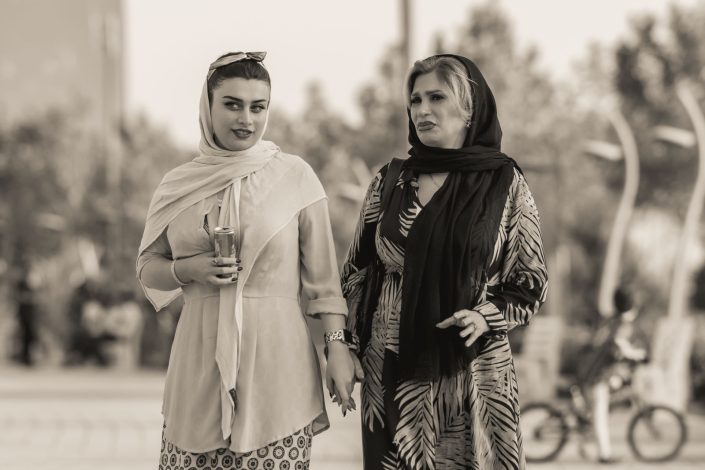 Mother and daughter near the artificial lake in Tehran