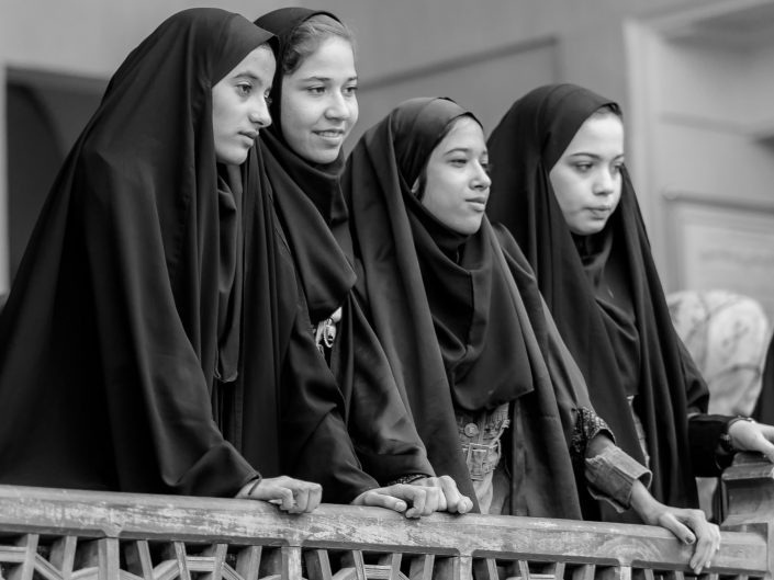Teenage girls posing on a school trip, Iran