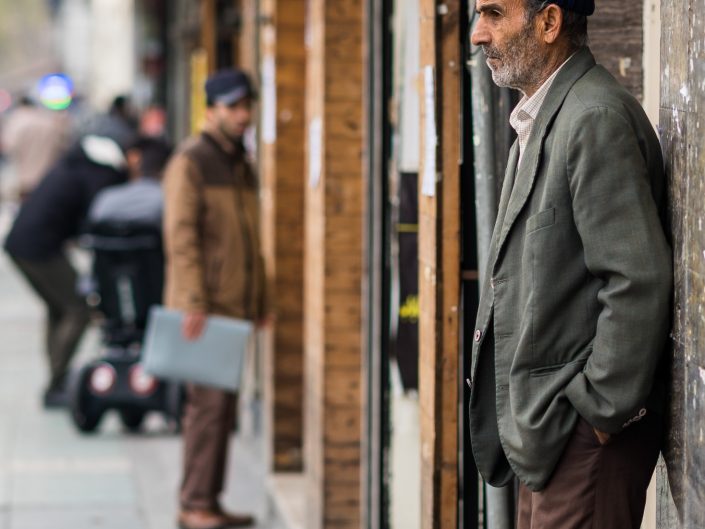 Iranian man with hat streets Tehran