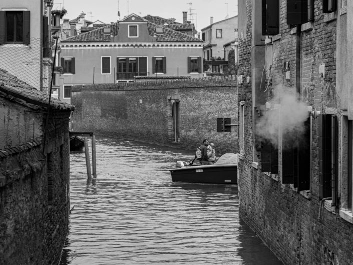 Venice boat transporting merchandise in the canals