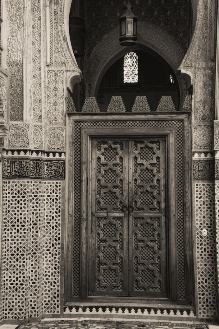 Carved door at the market in Fez