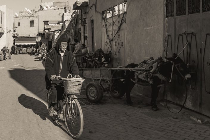 Man on a bicycle in a street in Marrakesh