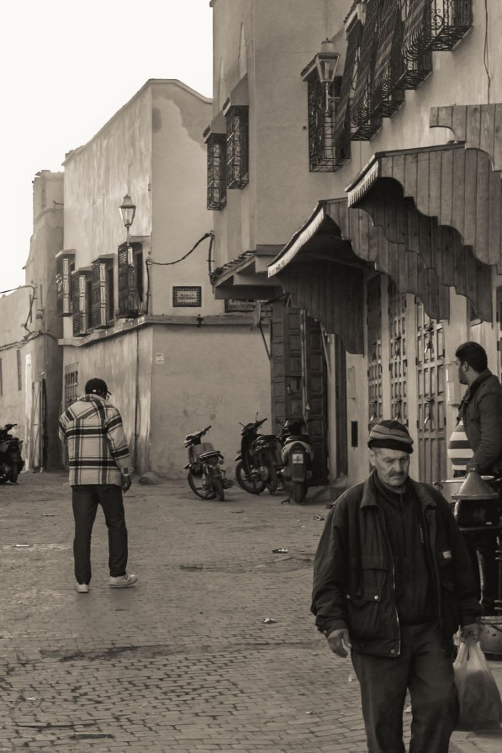 Man going down a street in Marrakesh